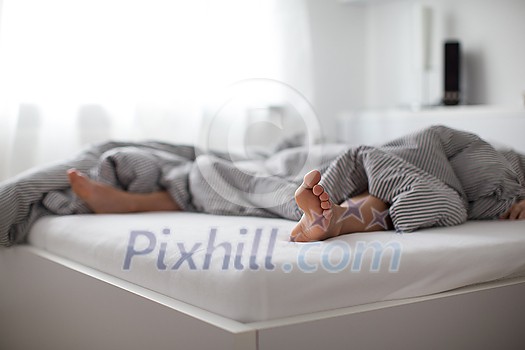 Pretty, young woman sleeping in bed Pretty, young woman sleeping in bed