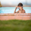 Cute little boy in a swimming pool