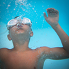 Cute little boy in a swimming pool
