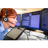 Call centre  employee communicating over phone using an external microphone for better sounf and ergonomics