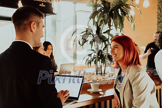 modern man and woman use modern devices, laptop, tablet and smartphone and arrange new projects for the job modern man and woman use modern devices, laptop, tablet and smartphone and arrange new projects for the job