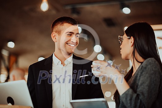 modern man and woman use modern devices, laptop, tablet and smartphone and arrange new projects for the job modern man and woman use modern devices, laptop, tablet and smartphone and arrange new projects for the job