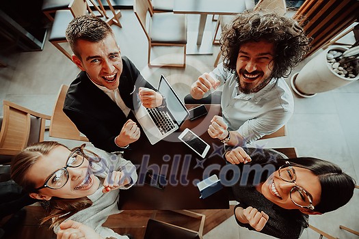 group of businessmen with their hands up celebrate successful business group of businessmen with their hands up celebrate successful business