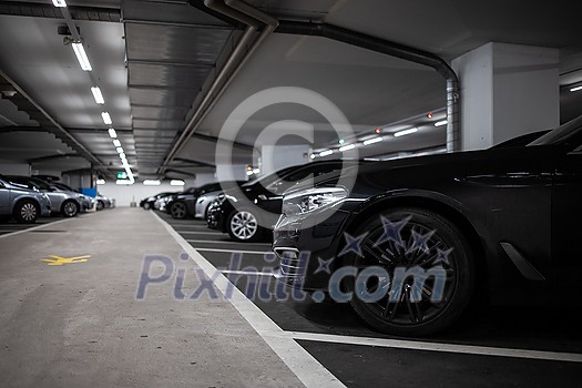 Underground parking/garage (shallow DOF; color toned image) Underground parking/garage (shallow DOF; color toned image)