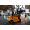 Forklift loader in storage warehouse shipyard. Distribution products. Delivery. Logistics. Transportation. Business background. High quality photo