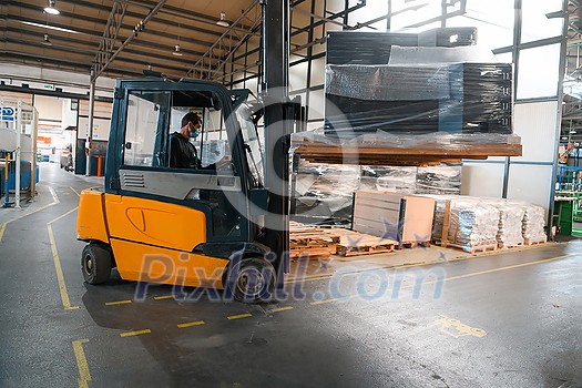 Forklift loader in storage warehouse shipyard. Distribution products. Delivery. Logistics. Transportation. Business background. High quality photo Forklift loader in storage warehouse shipyard. Distribution products. Delivery. Logistics. Transportation. Business background. High quality photo