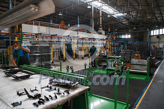 modern industrial factory for mechanical engineering equipment and machines manufacture of a production hall. High quality photo modern industrial factory for mechanical engineering equipment and machines manufacture of a production hall. High quality photo