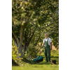 Senior gardenr gardening in his permaculture garden