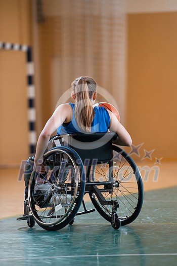photo of the basketball team of war invalids with professional sports equipment for people with disabilities on the basketball court. High quality photo photo of the basketball team of war invalids with professional sports equipment for people with disabilities on the basketball court. High quality photo