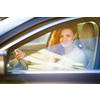 Pretty, young woman  driving a car -Invitation to travel. Car rental or vacation.