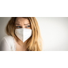 Young woman wearing a face mask during coronavirus and flu outbreak. Virus and illness protection, home quarantine. COVID-19 concept