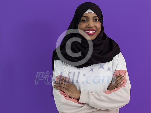 portrait of african muslim woman wearing hijab and traditional muslim clothes with cross hand posing in front of purple background
portrait of african muslim woman wearing hijab and traditional muslim clothes with cross hand posing in front of purple background