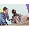 an african american and a young girl plan meetings together and use a laptop for an online meeting
