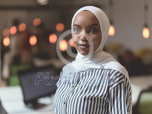 african muslim businesswoman portrait wearing hijab at creative modern startup coworking open space office african muslim businesswoman portrait wearing hijab at creative modern startup coworking open space office