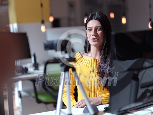 business woman have online meeting in modern open space coworking office as influencer making podcat or tutorial videos business woman have online meeting in modern open space coworking office as influencer making podcat or tutorial videos