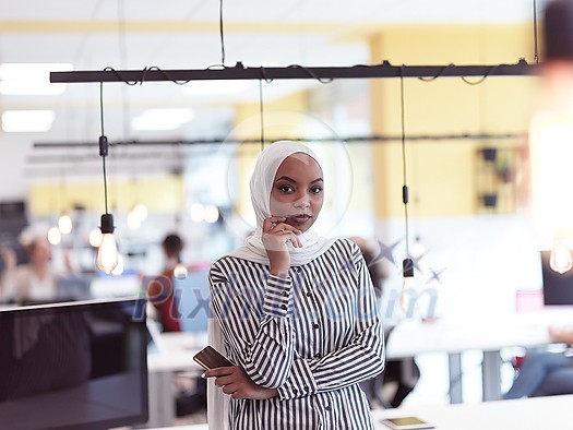african americam modern muslim businesswoman portrait wearing hijab at creative modern startup coworking open space office african americam modern muslim businesswoman portrait wearing hijab at creative modern startup coworking open space office