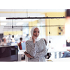 african americam modern muslim businesswoman portrait wearing hijab at creative modern startup coworking open space office