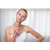 Lovely bride with a glass of white wine