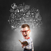Young funny big headed man in glasses with book in hands