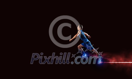Young running man athlete in blue wear Young running man athlete in blue wear