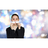 Happy cute girl trying male paper mustache