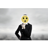 Unrecognizable businesswoman hiding her face behind sad mask