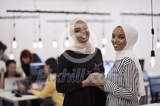 multiethnic startup business people team portrait at modern coworking office space multiethnic startup business people team portrait at modern coworking office space