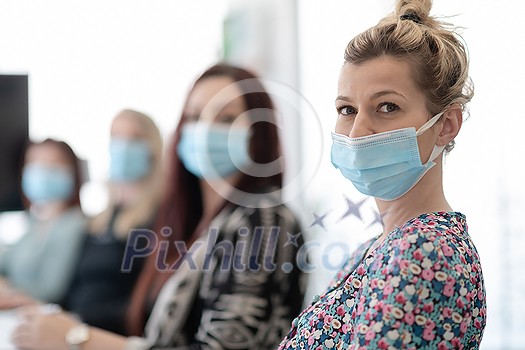 real businesspeople on business meeting in bright office on coronavirus new normal time wearing protective medical face mask and keep distance real businesspeople on business meeting in bright office on coronavirus new normal time wearing protective medical face mask and keep distance