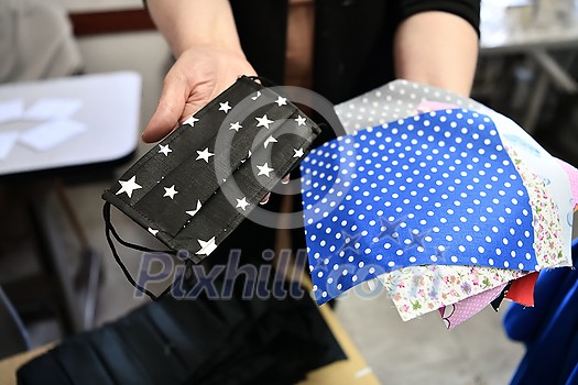 Homemade Manufacturing Of Protective Trendy Medical Face Mask. Tailor Woman Sewing With Machine At Home, Healthcare New Normal Concept In Coronavirus Covid19 Lockdown Homemade Manufacturing Of Protective Trendy Medical Face Mask. Tailor Woman Sewing With Machine At Home, Healthcare New Normal Concept In Coronavirus Covid19 Lockdown