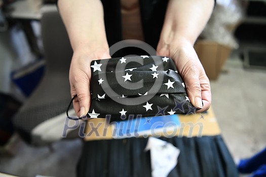 Homemade Manufacturing Of Protective Trendy Medical Face Mask. Tailor Woman Sewing With Machine At Home, Healthcare New Normal Concept In Coronavirus Covid19 Lockdown Homemade Manufacturing Of Protective Trendy Medical Face Mask. Tailor Woman Sewing With Machine At Home, Healthcare New Normal Concept In Coronavirus Covid19 Lockdown