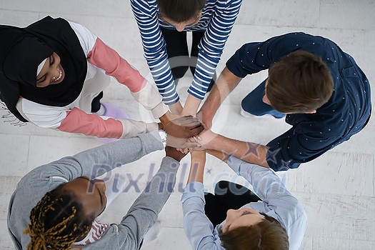 a top view of diverse group of people standing embracing and symbolizing togetherness
a top view of diverse group of people standing embracing and symbolizing togetherness