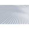 tracks on ski slopes in snow at beautiful sunny  winter day with blue sky
