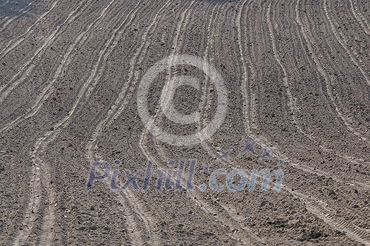 tractor trails with ground and grass background representing agriculture concept tractor trails with ground and grass background representing agriculture concept