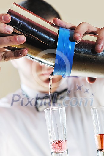 pro barman prepare coctail drink and representing nightlife and party event concept pro barman prepare coctail drink and representing nightlife and party event concept