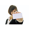 young business woman isolated on white showing and displaying empty business card ready for text