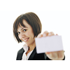 young business woman isolated on white showing and displaying empty business card ready for text