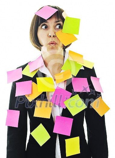 one frustrated young business woman with many of post it representing concept memory and frustration on work one frustrated young business woman with many of post it representing concept memory and frustration on work