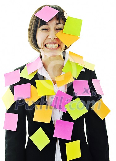 one frustrated young business woman with many of post it representing concept memory and frustration on work one frustrated young business woman with many of post it representing concept memory and frustration on work