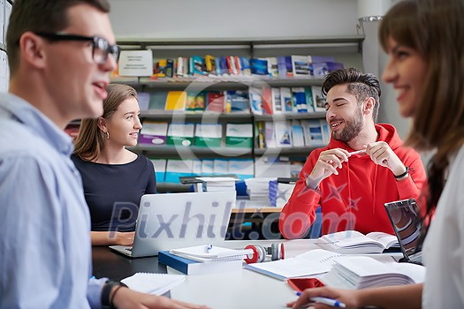 students in a modern environment work together to more easily complete a school project students in a modern environment work together to more easily complete a school project