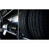 Tyre change - wheel balancing or repair and change car tire at auto service garage or workshop by mechanic