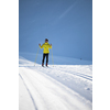 Cross-country skiing: young man cross-country skiing on a winter day