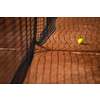 Tennis court with tennis balls and the net