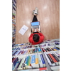 top view of a young student with glasses sits in the library, reads a book and makes notes with a latpop