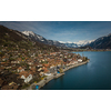 The crystal clear blue water of Lake Brienz in the Swiss Alps - Switzerland from above