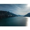 The crystal clear blue water of Lake Brienz in the Swiss Alps - Switzerland from above