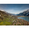 The crystal clear blue water of Lake Brienz in the Swiss Alps - Switzerland from above