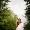 Portrait of a relaxed middle aged woman outdoors, looking happy, enjoying the life