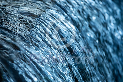 Water cocept - river water flowing with light reflecting of its surface Water cocept - river water flowing with light reflecting of its surface