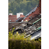 Storm damaged roof, destroyed roof tiles, expensive damage needing prompt repair