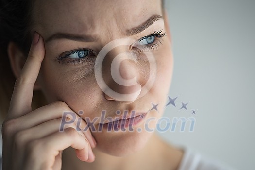 Anxious, worried, stressed young woman looking pensive, pondering, deep in thoughts. Anxious, worried, stressed young woman looking pensive, pondering, deep in thoughts.